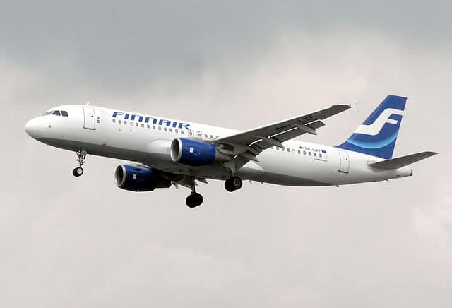 A commercial plane flying in the sky