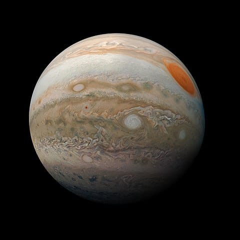 The colorful planet, Jupiter, with its red spot clearly visible. Photo from