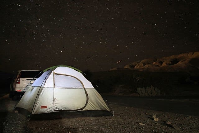 Camping under the night sky