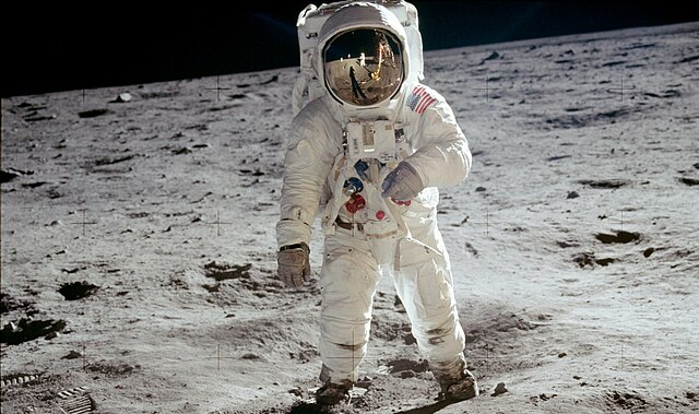 An Apollo 11 astronaut on the Moon.