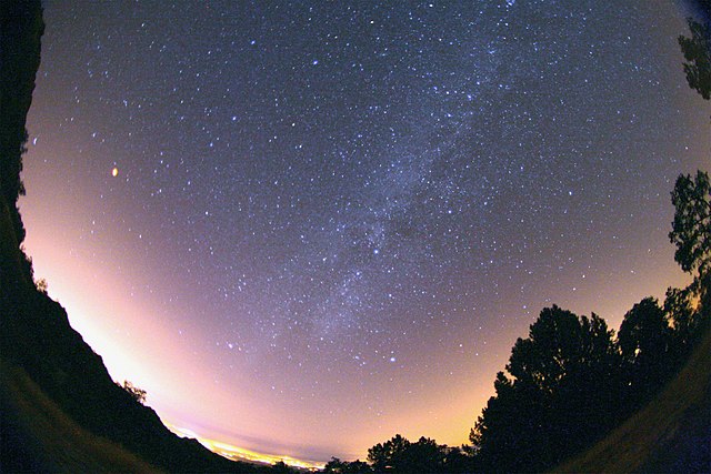 Total lunar eclipse and milky way