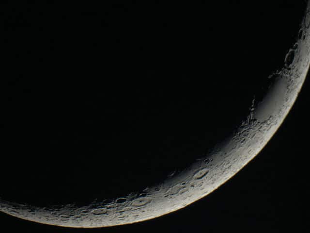 A close-up of the moon Description automatically generated