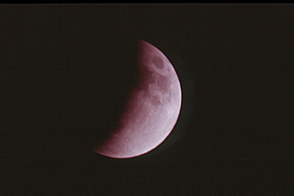 A close-up of the moon
Description automatically generated