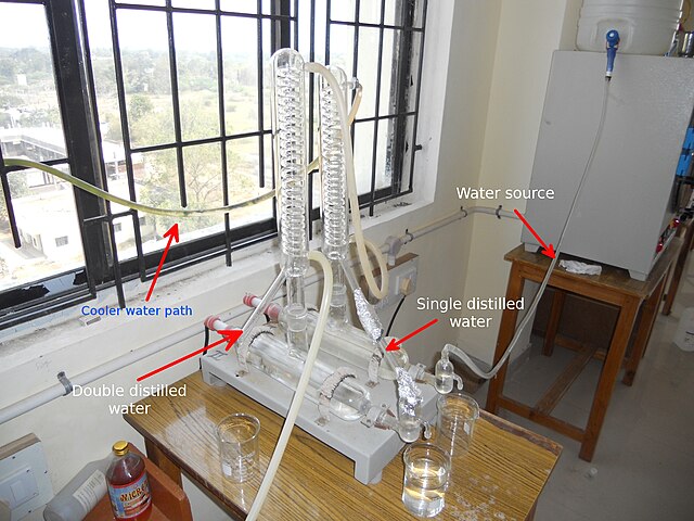 A distillation apparatus with text on it