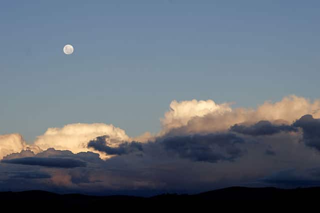 A moon in the sky
Description automatically generated