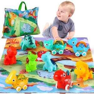 1 year old baby playing with dinosaur toy