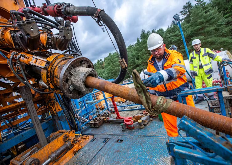 Workers at the drilling site