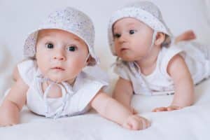 Funny twins sisters babies